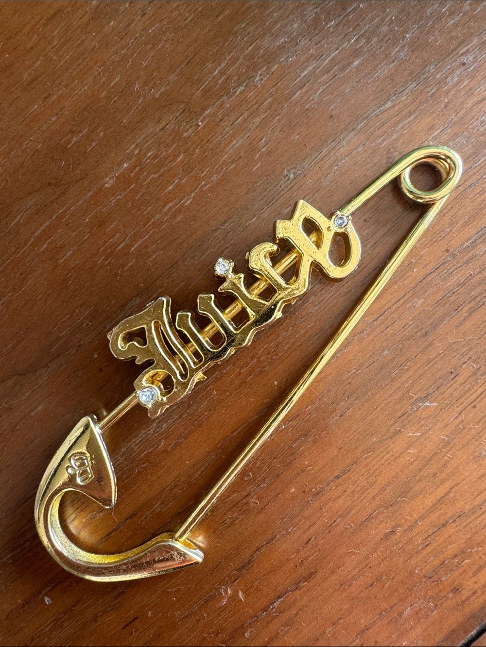Juicy Couture Gold-Tone Script Safety Pin Brooch with Crystal Accents